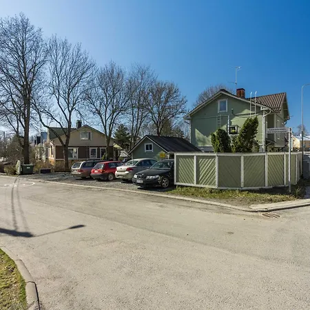 Self-service Wooden With Parking Near Aura River *