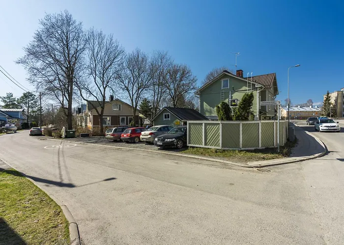 Self-service Wooden With Parking Near Aura River *